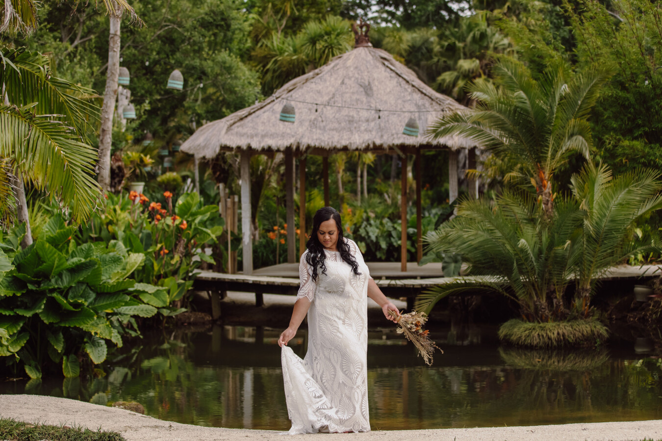 Plus Size Bride wearing Zephyrine - Wedding Gown Aroha an allover boho lace gown