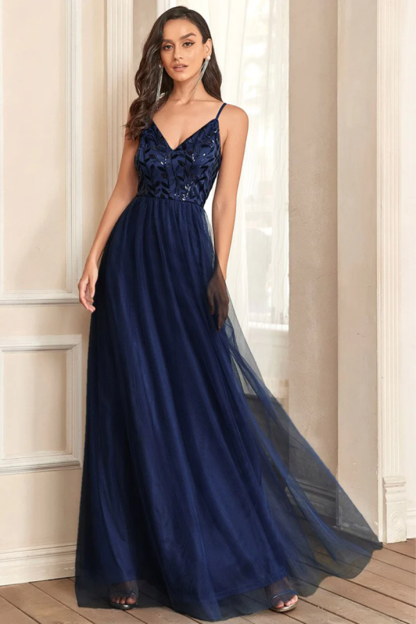 Ballgown style EE50090 Soft a-line gown with v-neck, shoestring straps with sequin bodice and net skirt.