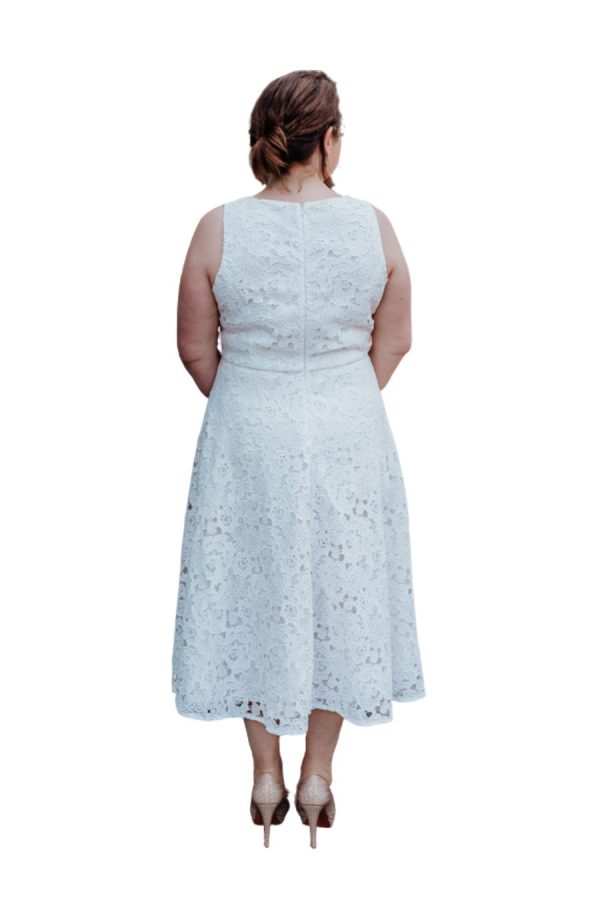 Beautiful a-line lace midi dress with round neck. Style Jasmine suitable for special occasions that call for a semi formal white or ivory dress.