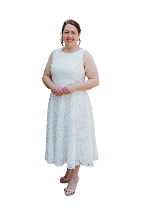 Beautiful a-line lace midi dress with round neck. Style 2107L suitable for special occasions that call for a semi formal white or ivory dress.