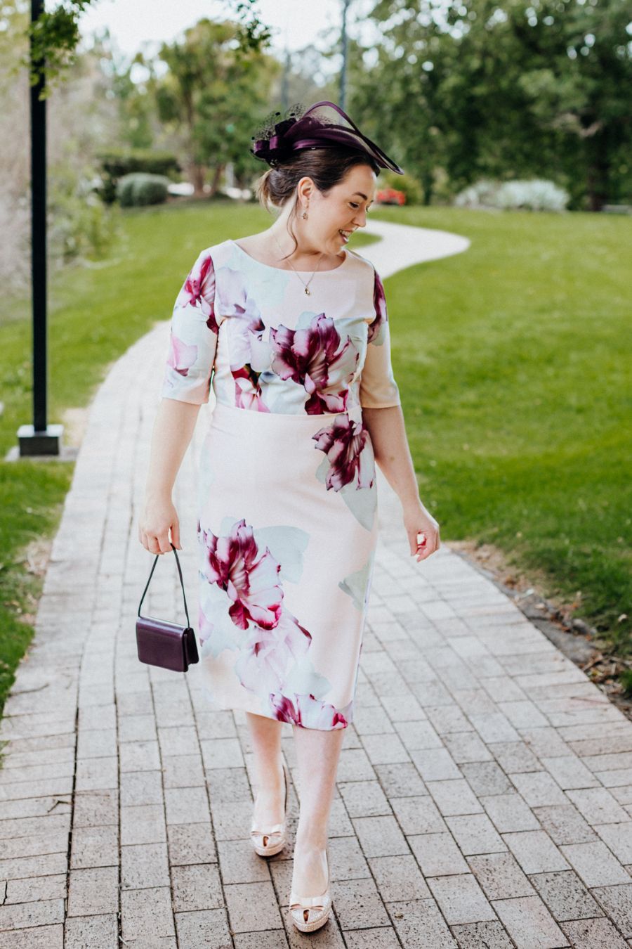 Pink Floral Dress with aubergine Hat & Clutch Bag - Side view